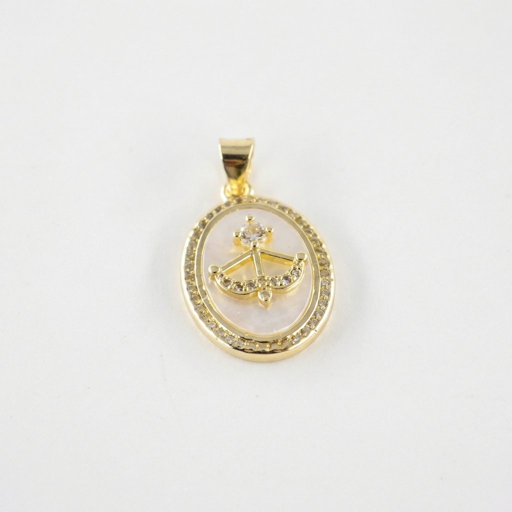 Dije Chapa de oro 18K · DI-063
